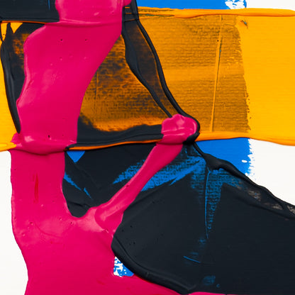 Close-up of matte pink acrylic paint layered over black textured acrylic with yellow and blue sections on white paper.