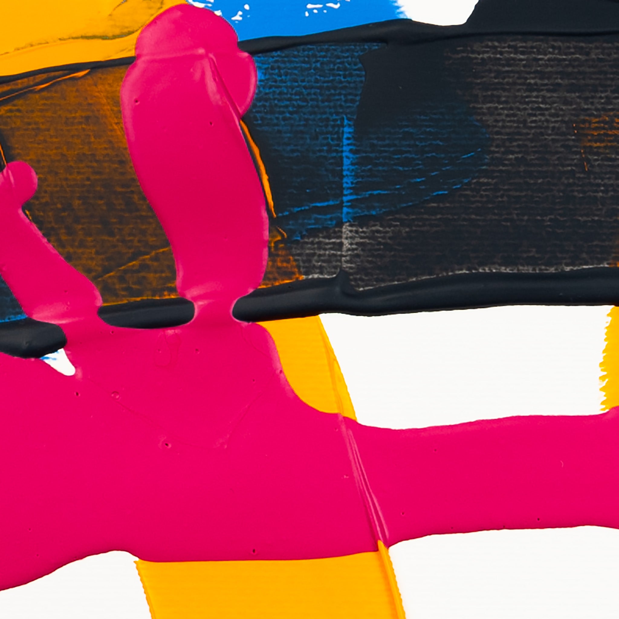 Close-up of matte pink acrylic paint intersecting dark grey textured forms with yellow and blue sections on white paper.