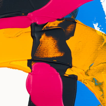 Close-up of matte pink acrylic paint intersecting dark grey textured forms with yellow and blue sections on white paper.