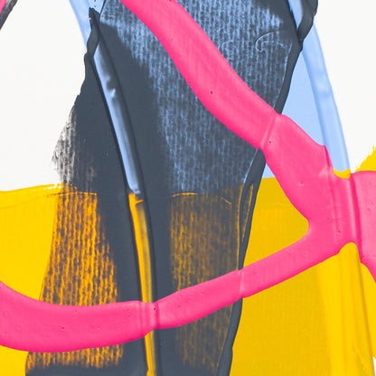 Abstract close-up of a colorful garment or textile with bright pink bands, a yellow lower section, a dark charcoal central panel, and pale blue areas.