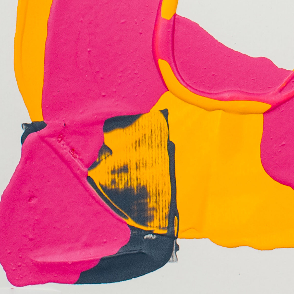 Abstract close-up of thick paint with large areas of hot pink and bright yellow, plus a dark charcoal patch, on a light gray background.