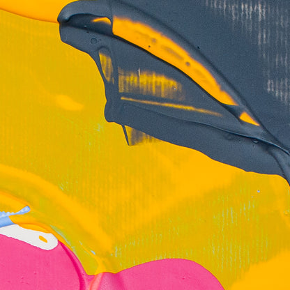 Abstract close-up of thick paint with a large area of bright yellow, a dark charcoal gray brushstroke, and a pink section.