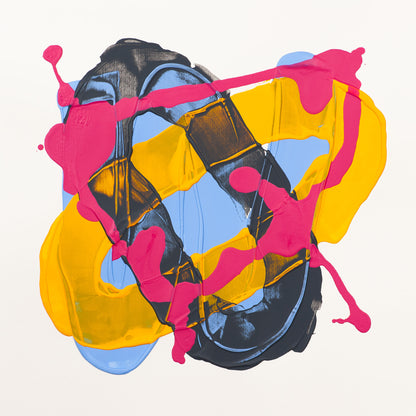 An abstract art print featuring a central black and blue shoe-like form layered over bold yellow and pink paint splashes and drips on a light cream background.