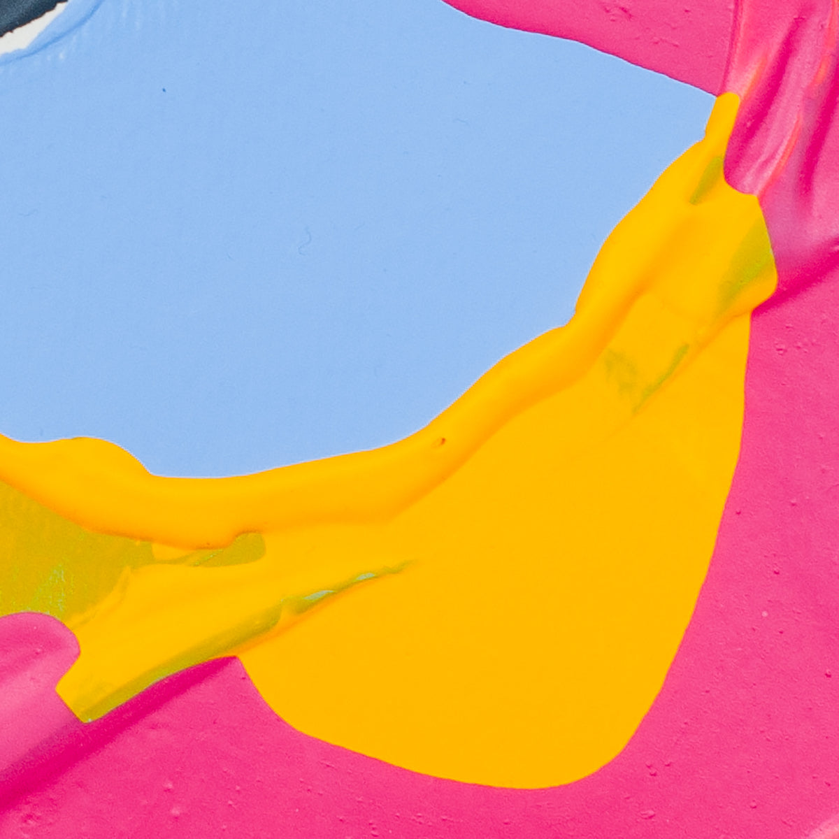 Abstract close-up of bright pink and light blue surfaces with a bold yellow curved shape crossing the center.