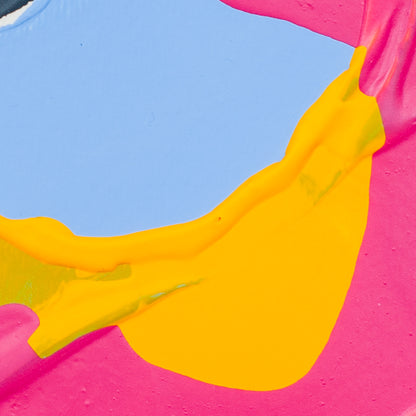 Abstract close-up of bright pink and light blue surfaces with a bold yellow curved shape crossing the center.