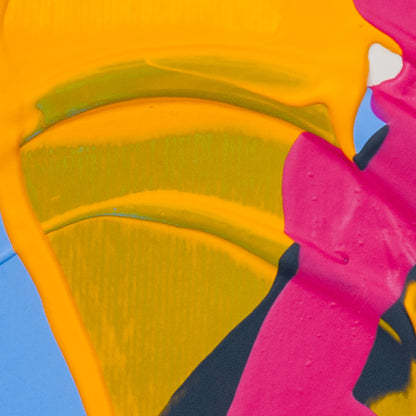 Close-up of an abstract painting with vivid yellow, hot pink, light blue and dark charcoal shapes with textured brushstrokes.